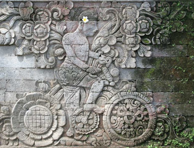 Ancient bicycle on the wall carving richard-seaman.com